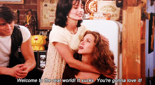 Monica and Rachel from TV show friends hugging with text Welcome to the real world! It sucks. You're gonna love it!
