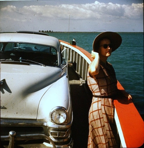 wrinklesoftime:

A fabulous place to vacation in the past and today! Lady with Hat and Chrysler on a Ferry - Sanibel Island, Florida 1953 by Mike Leavenworth, via Flickr
http://www.pinterest.com/pin/247346204509689204/

