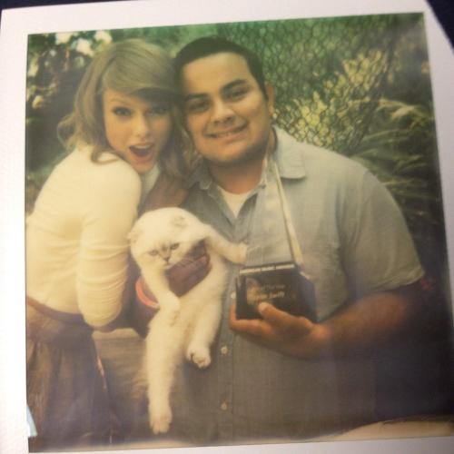  Taylor with a fan in her home in Los Angeles 9/20/14 (x) 