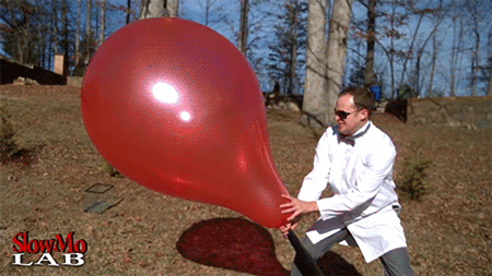 soundssimpleright:

fencehopping:Giant balloon popping in slow motion.So the coolest thing about this gif is that you can really see how the sun is reflected off of TWO surfaces on the balloon — the outside AND THE INSIDE