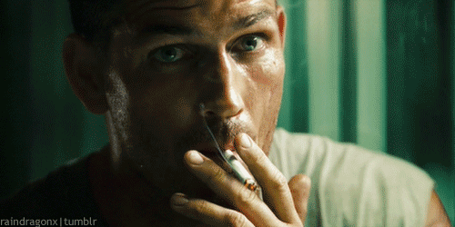Jim Caviezel smoking a cigarette (or weed)
