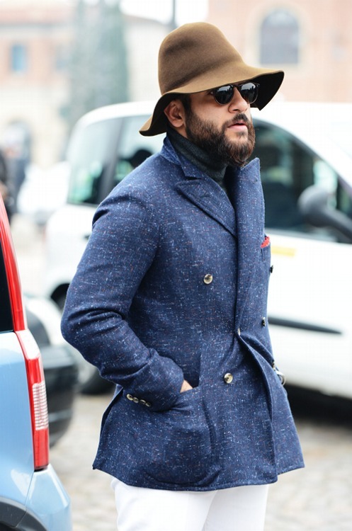 Agyesh Madan in blue Isaia double-breasted jacket