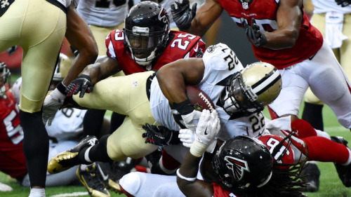 Mark Ingram lunges for one of his two Week 1 touchdowns. (USATSI)