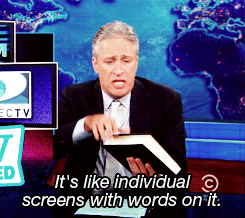 Jon Stewart saying "It's like individual screens with words on it" as he opens a book